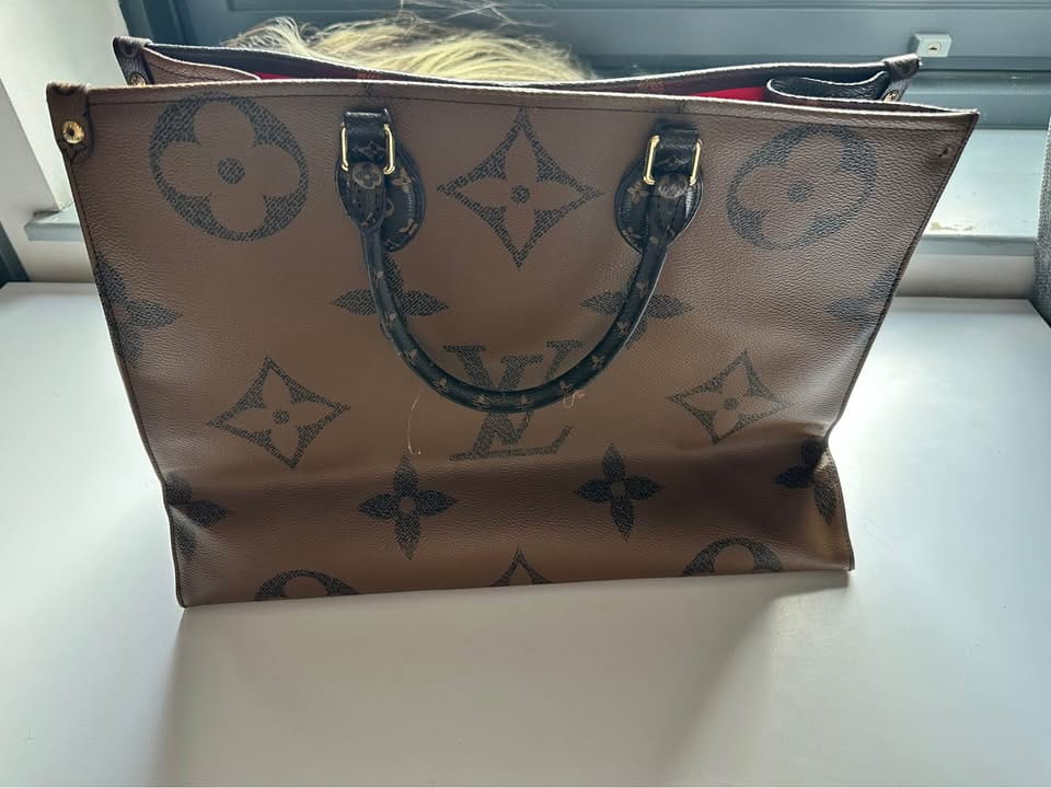 Louis Vuitton On the Go Travel Bag