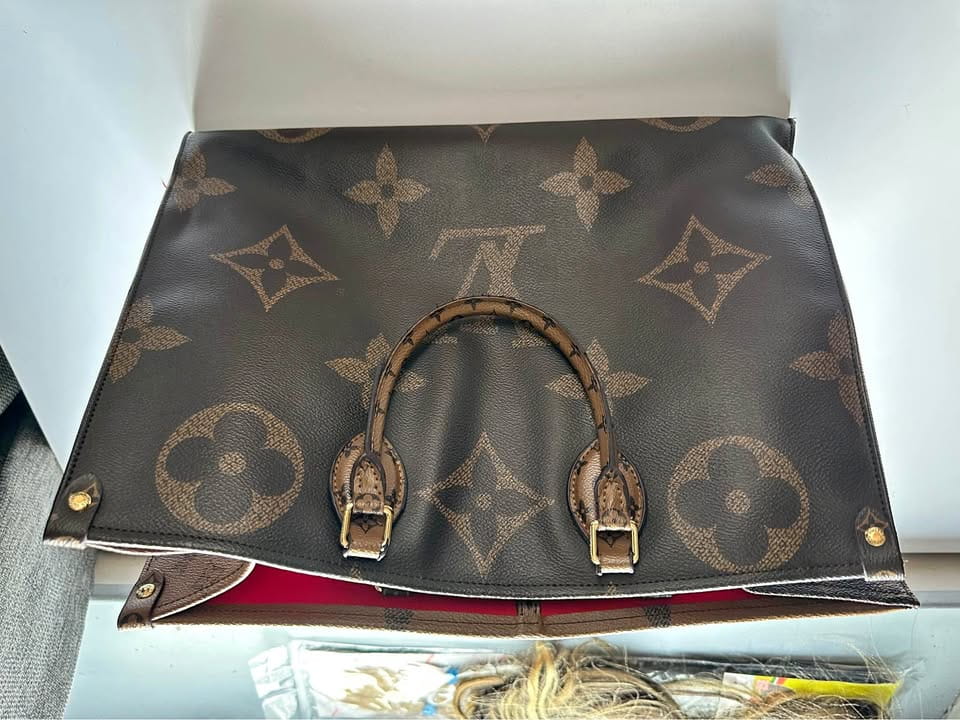 Louis Vuitton On the Go Travel Bag