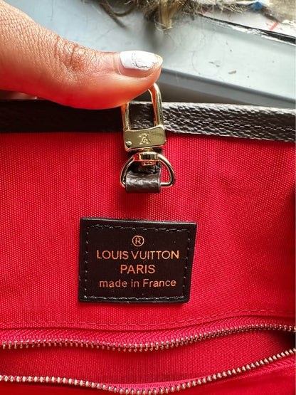 Louis Vuitton On the Go Travel Bag